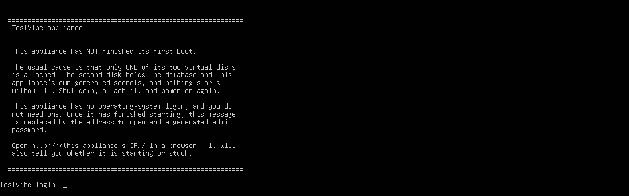The VM console showing the TestVibe appliance notice: this appliance has NOT finished its first boot, the usual cause is that only one of its two virtual disks is attached, with a testvibe login prompt underneath.